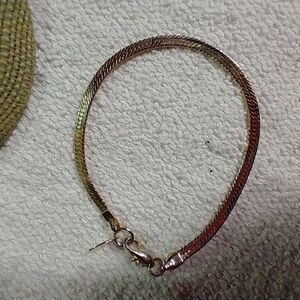 Goldtone Claire's herringbone bracelet